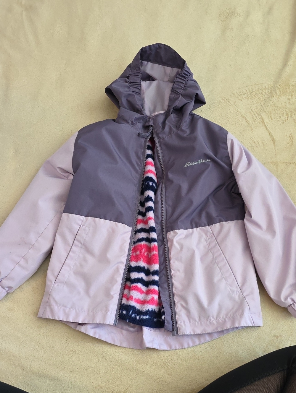 Eddie Bauer Two-Tone Hooded Rain Jacket in Lavender and Purple.